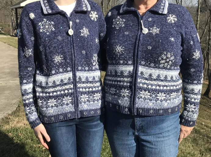 the two wearing the same sweater