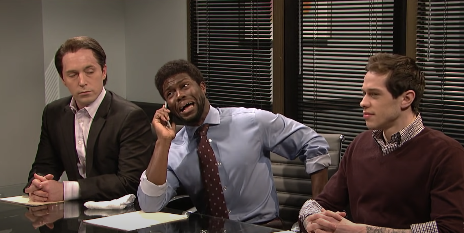 three men in an office at work