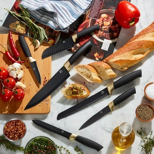 A set of knives with spices and herbs