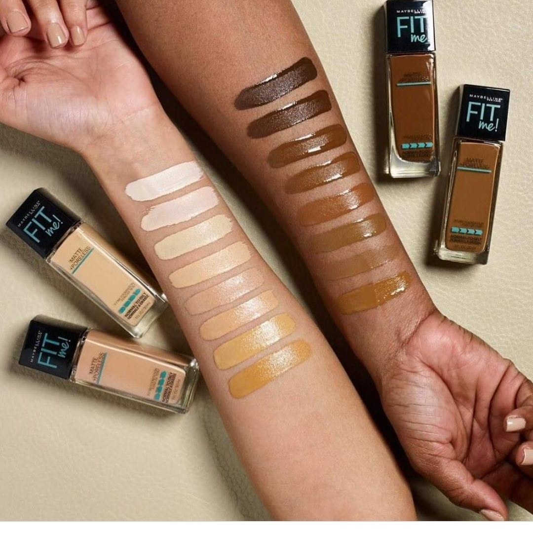 Models swatching the foundation