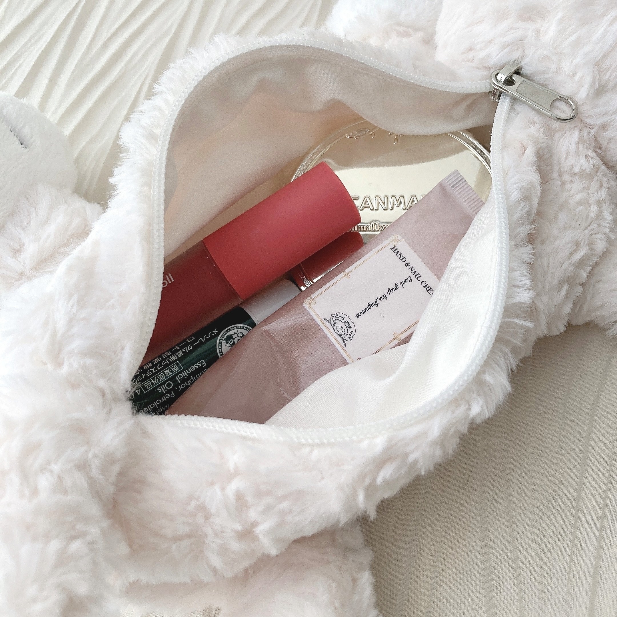 PLAZA（プラザ）で見つけたオススメのポーチ「ニキ NICI フィギュアポーチ シロネコ」