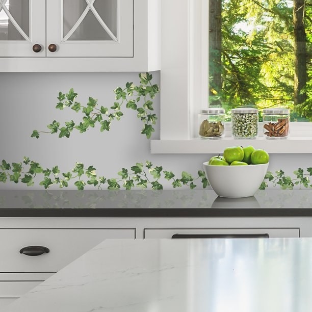 the ivy decal on a kitchen wall