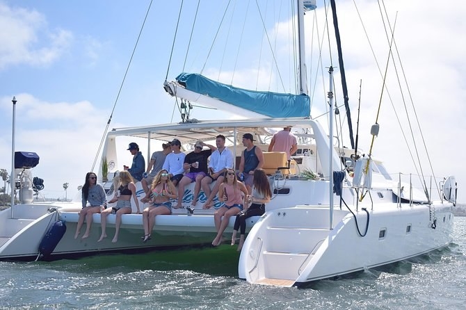 people having fun on a catamaran