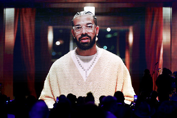 Drake on a screen at the Grammys