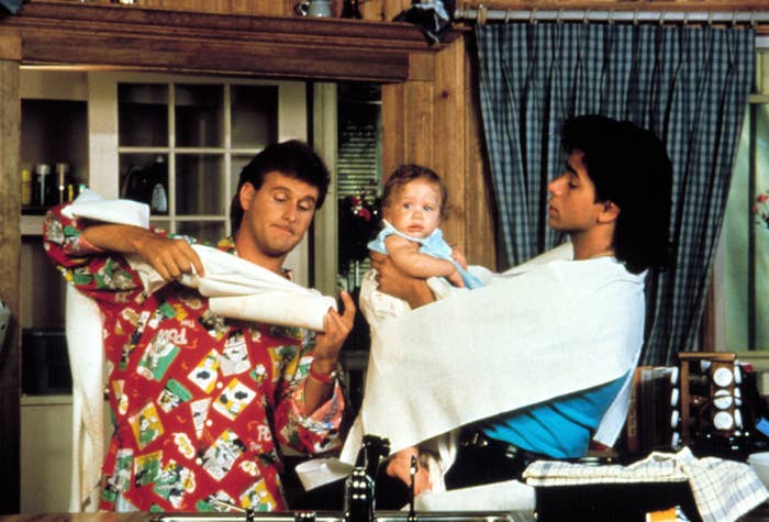 Uncle Jessie and Joey wrangling one of the twins on set