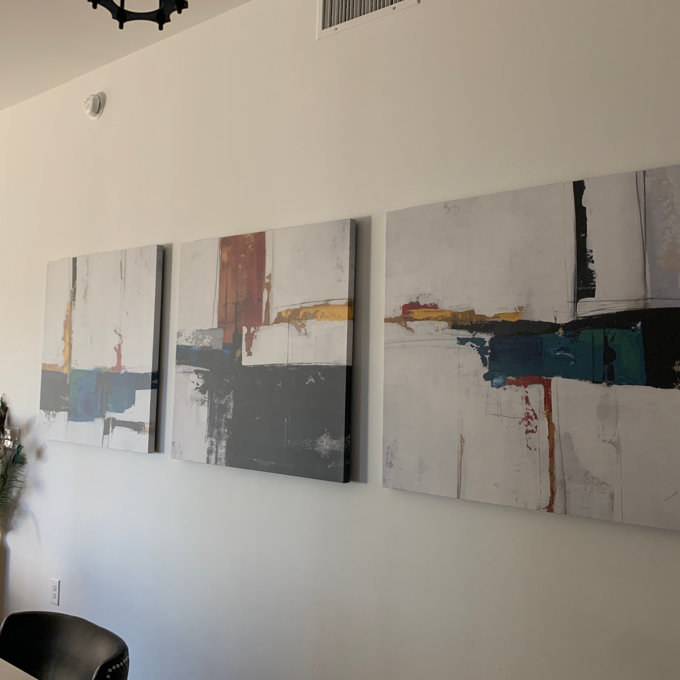 reviewer&#x27;s photo of the wall art hanging