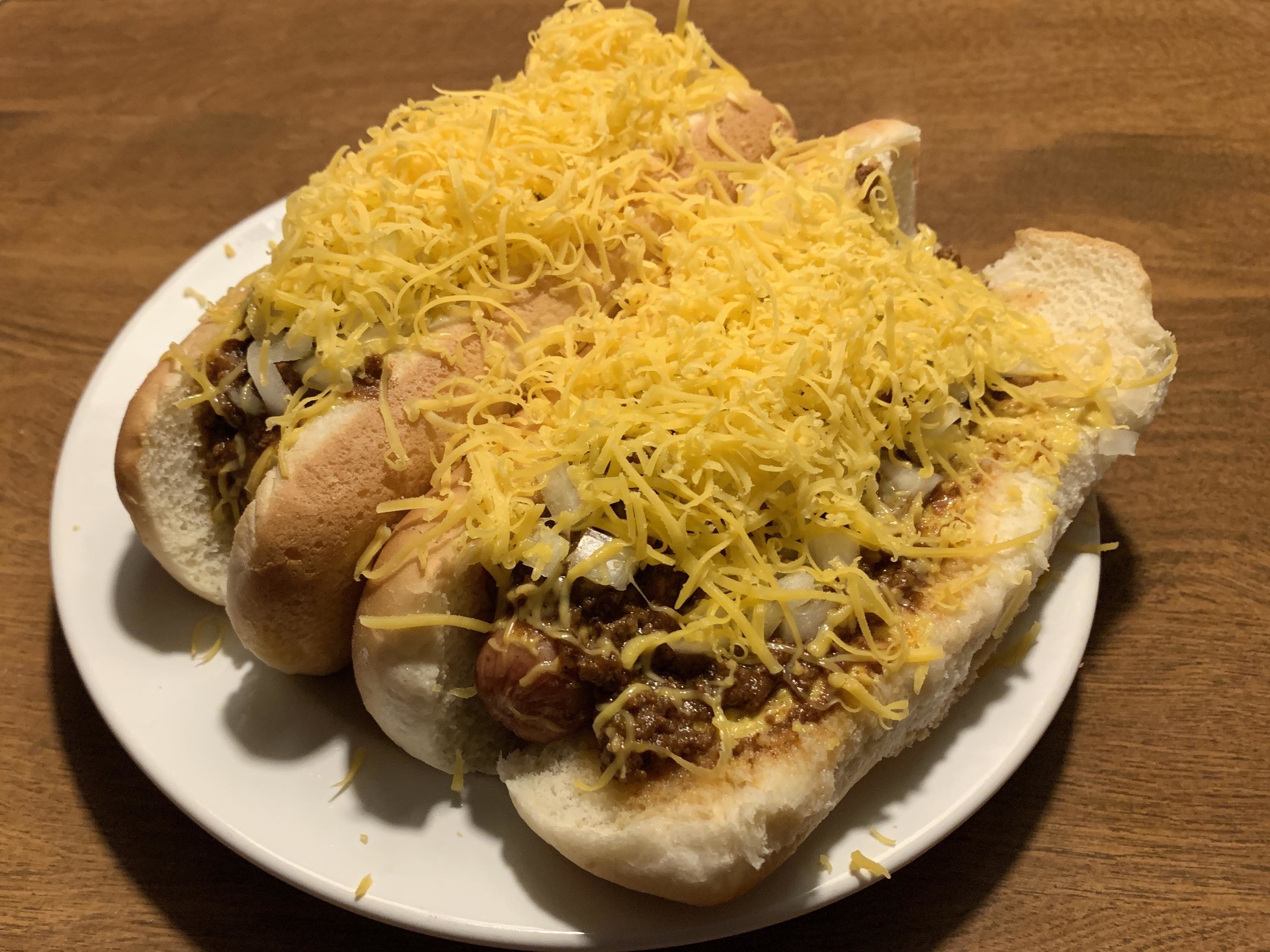 Chili dogs topped with cheese
