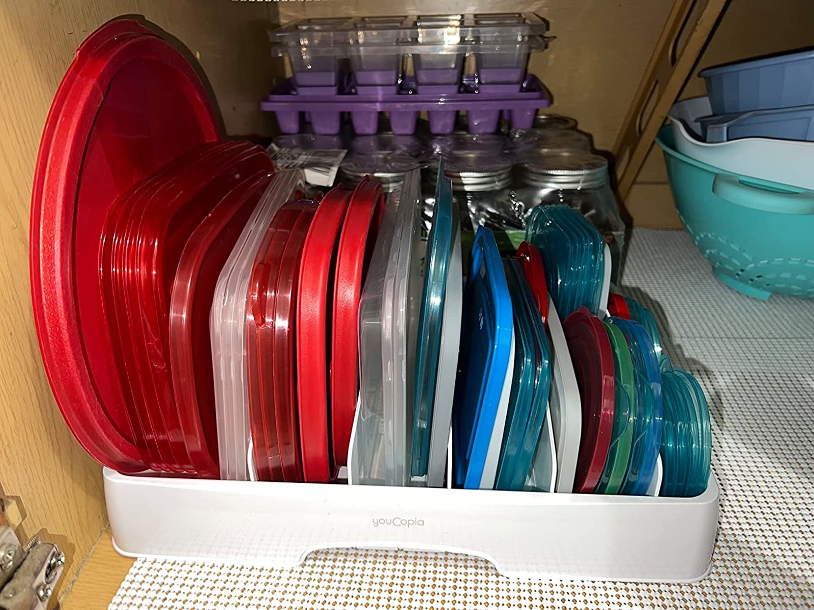 Reviewer image of Tupperware lids in organizer