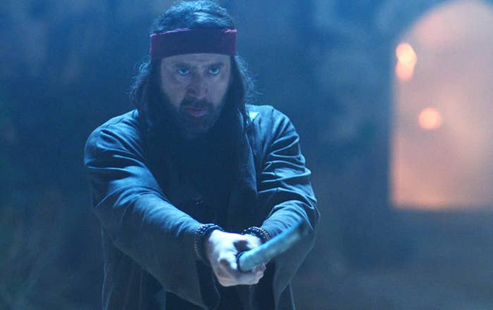 Nicholas holding a sword in a scene from a film