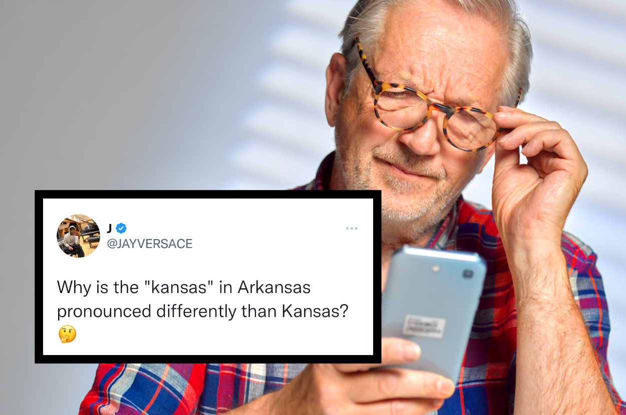 A man looks at his phone. A tweet asks why "Kansas" differs from "Arkansas"