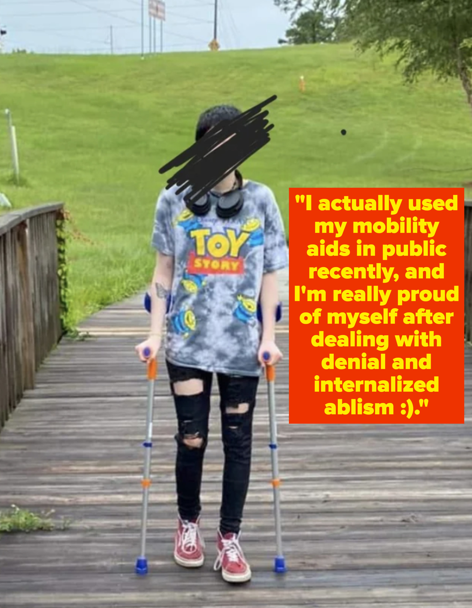 person using mobility sticks to walk