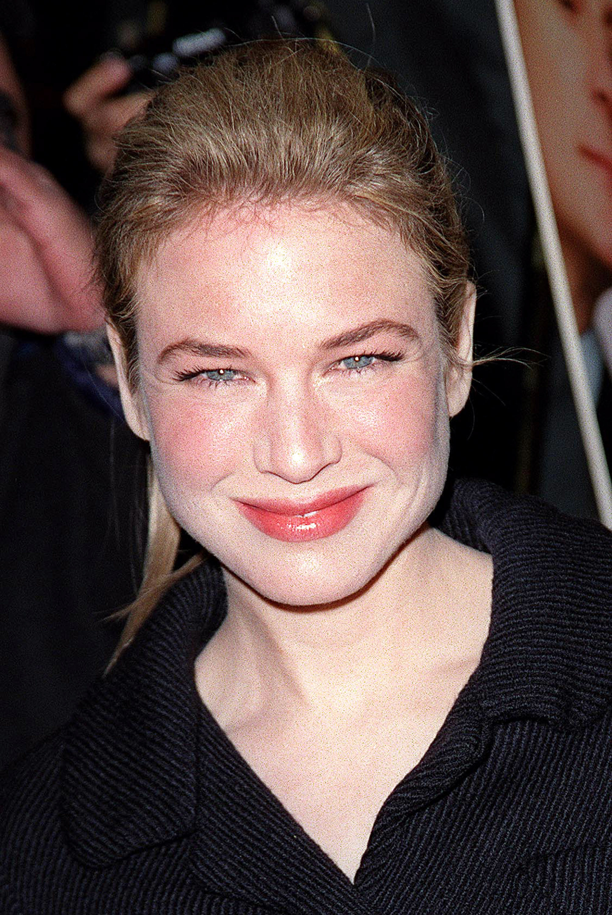A closeup shot of Renee Zellweger's face smiling at the camera during Bridget Jones's Diary Premiere