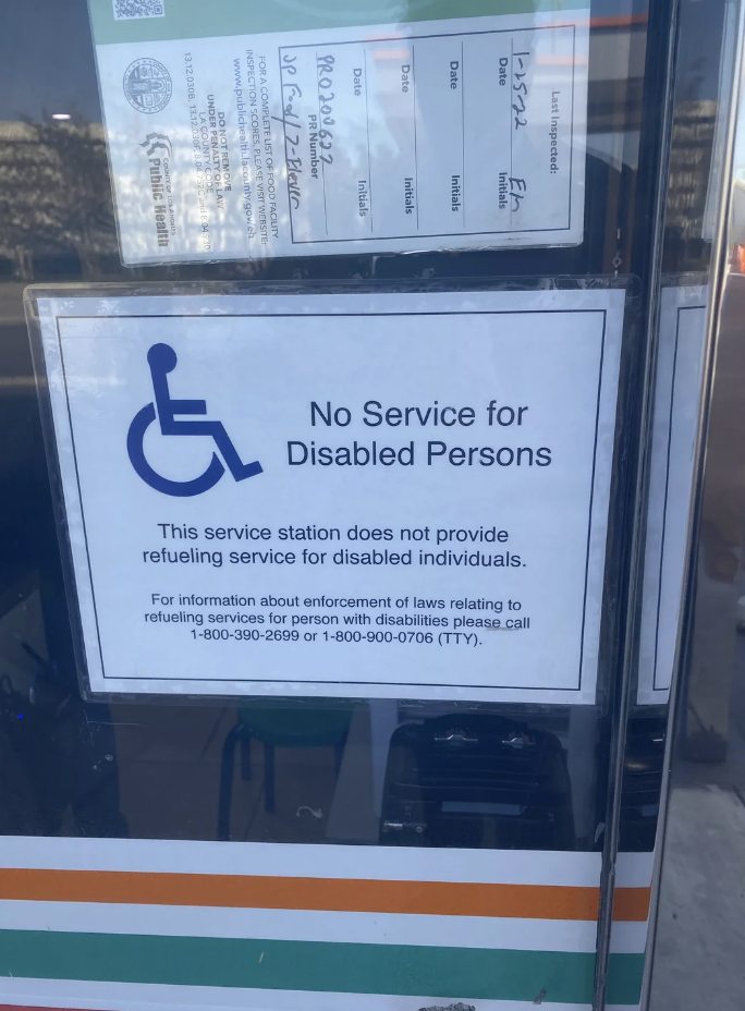 sign saying there is no service for disable persons