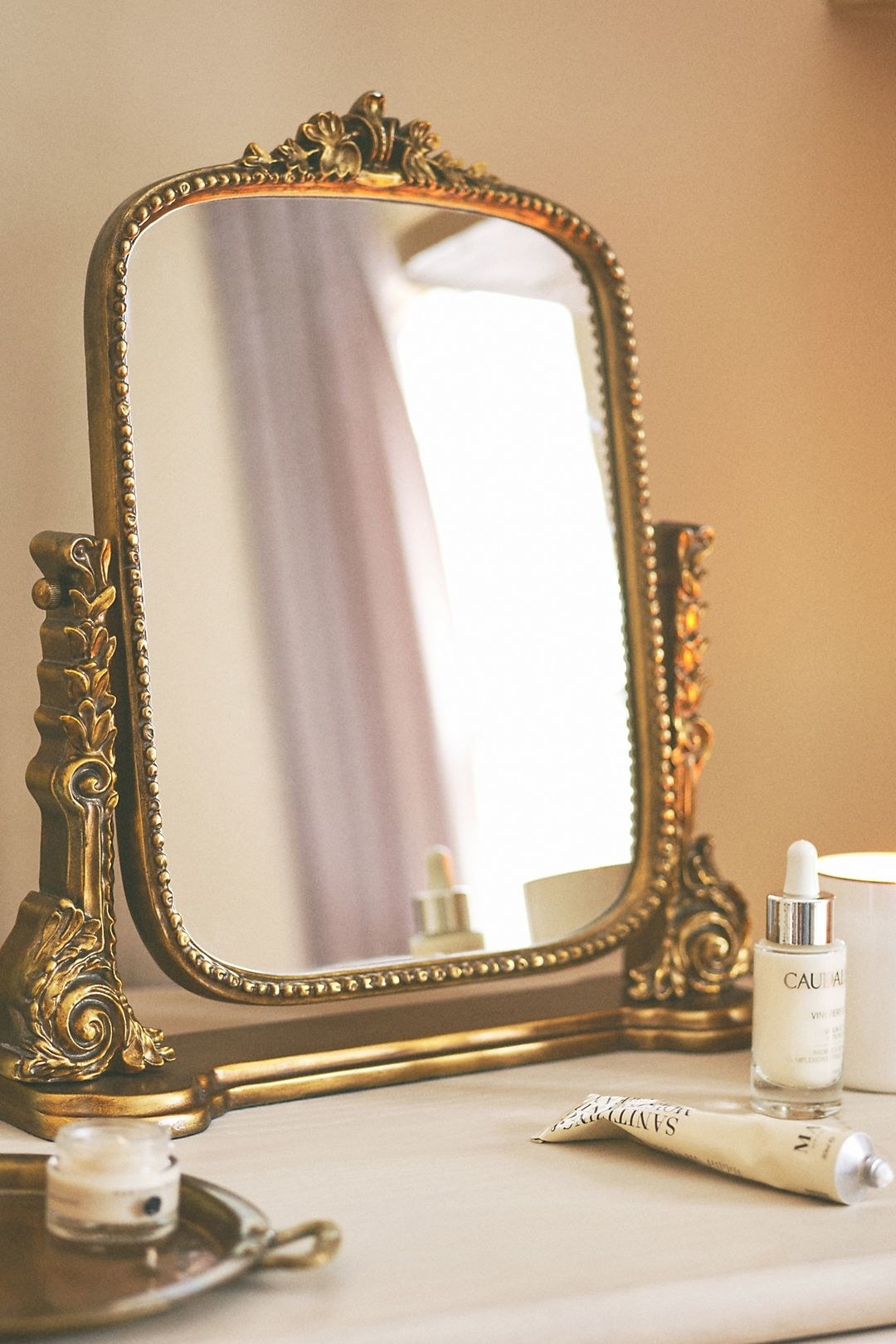 ornate small gold vanity mirror