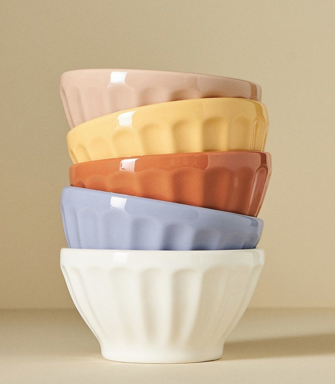 latte cereal bowls in white, purple, orange, yellow, and pink