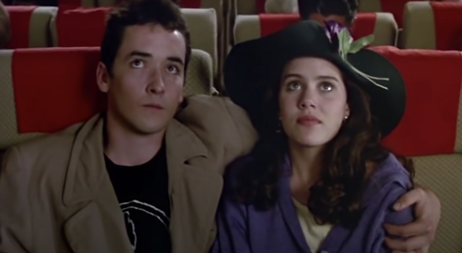 John Cusack with his arm around Ione Skye in a scene from "Say Anything"
