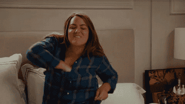 Katie Otto from American Housewife rips her bra off with a sigh of relief