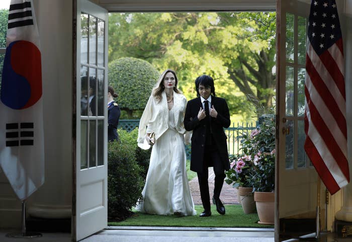 Angelina and Maddox walking into the White House