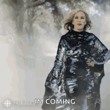 Moira from Schitt's Creek walks forward in a jaw-dropping gown as birds fly around her
