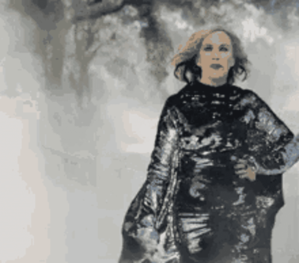 Moira from Schitt&#x27;s Creek walks forward in a jaw-dropping gown as birds fly around her