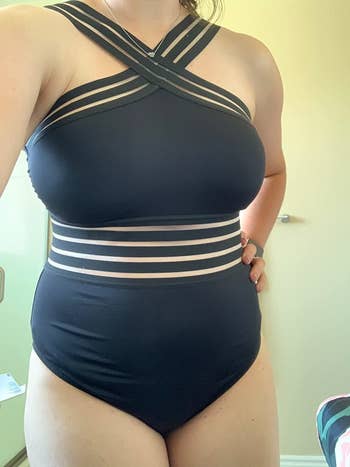 Image of reviewer wearing black swimsuit