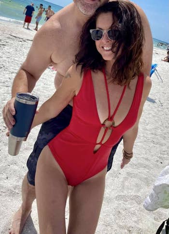 Image of reviewer wearing red swimsuit