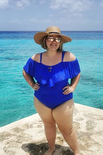 Image of reviewer wearing blue swimsuit