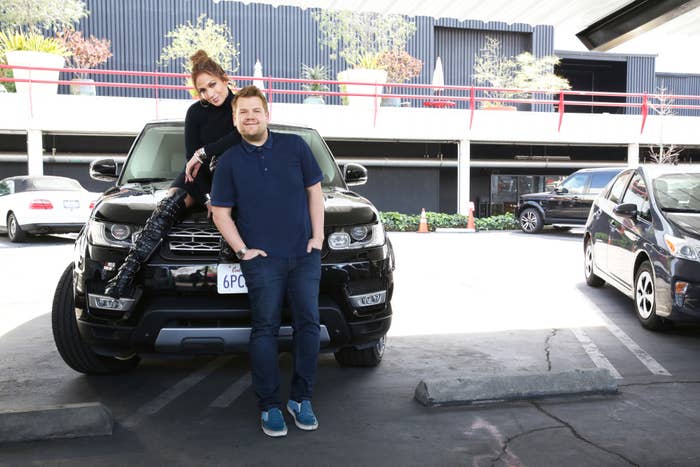 JLo and James in front of a car