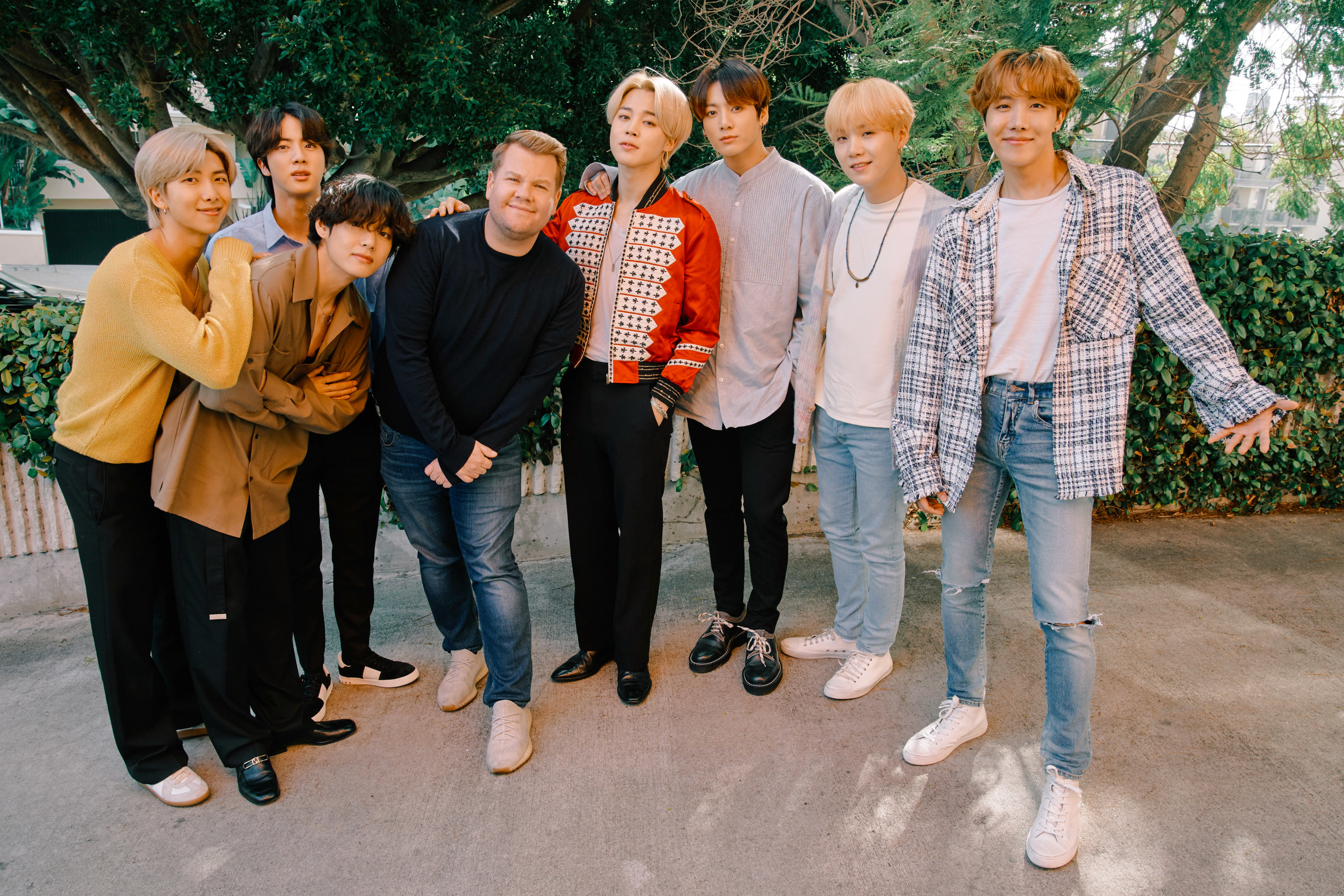 James with the members of BTS