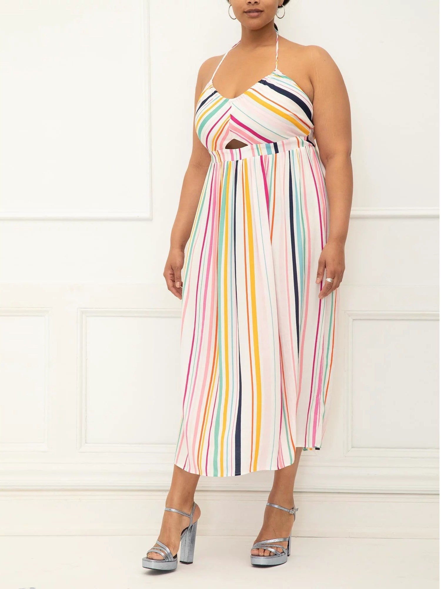 Model wears a halter midi dress
