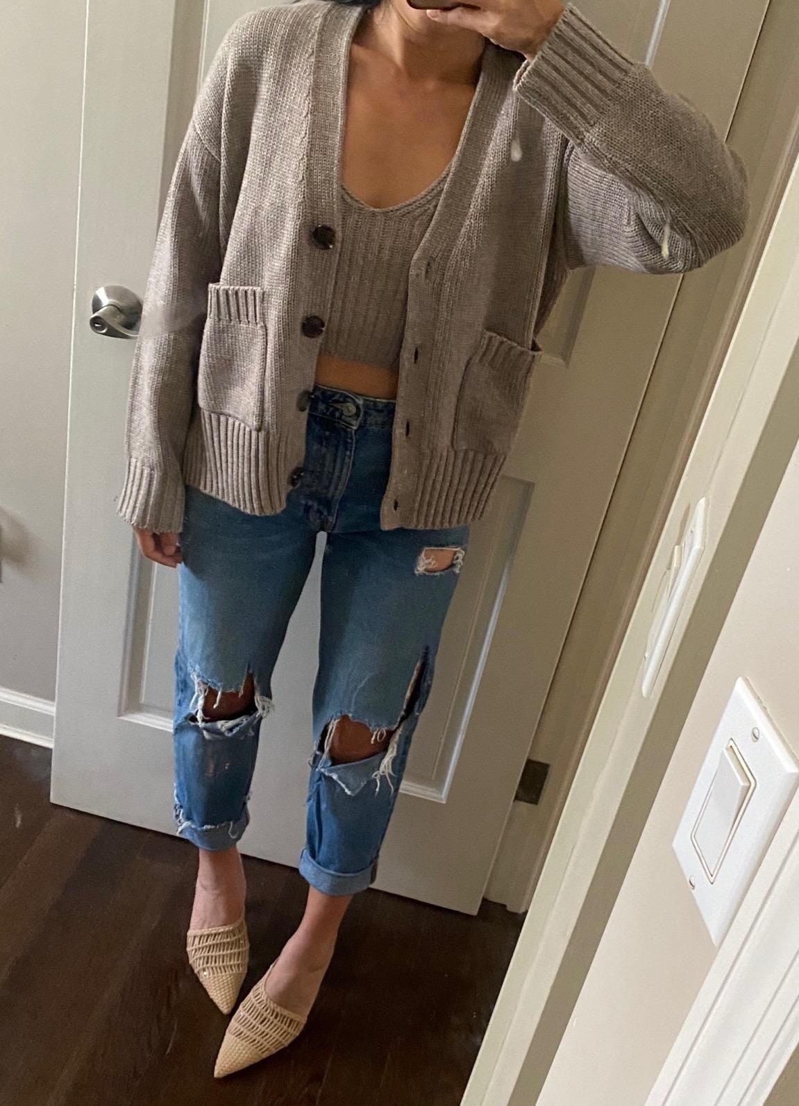 a reviewer wearing the taupe cardigan