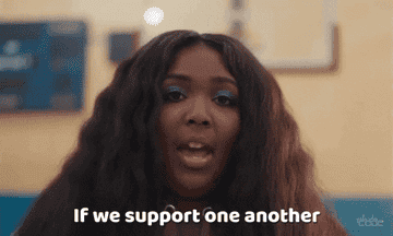 A close-up of Lizzo saying &quot;If we support one another, we rise together&quot;