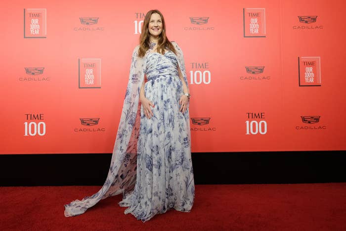 Drew in a gown with train at the Time 100 Gala red carpet