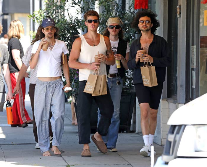 Shawn and friends walking down the street