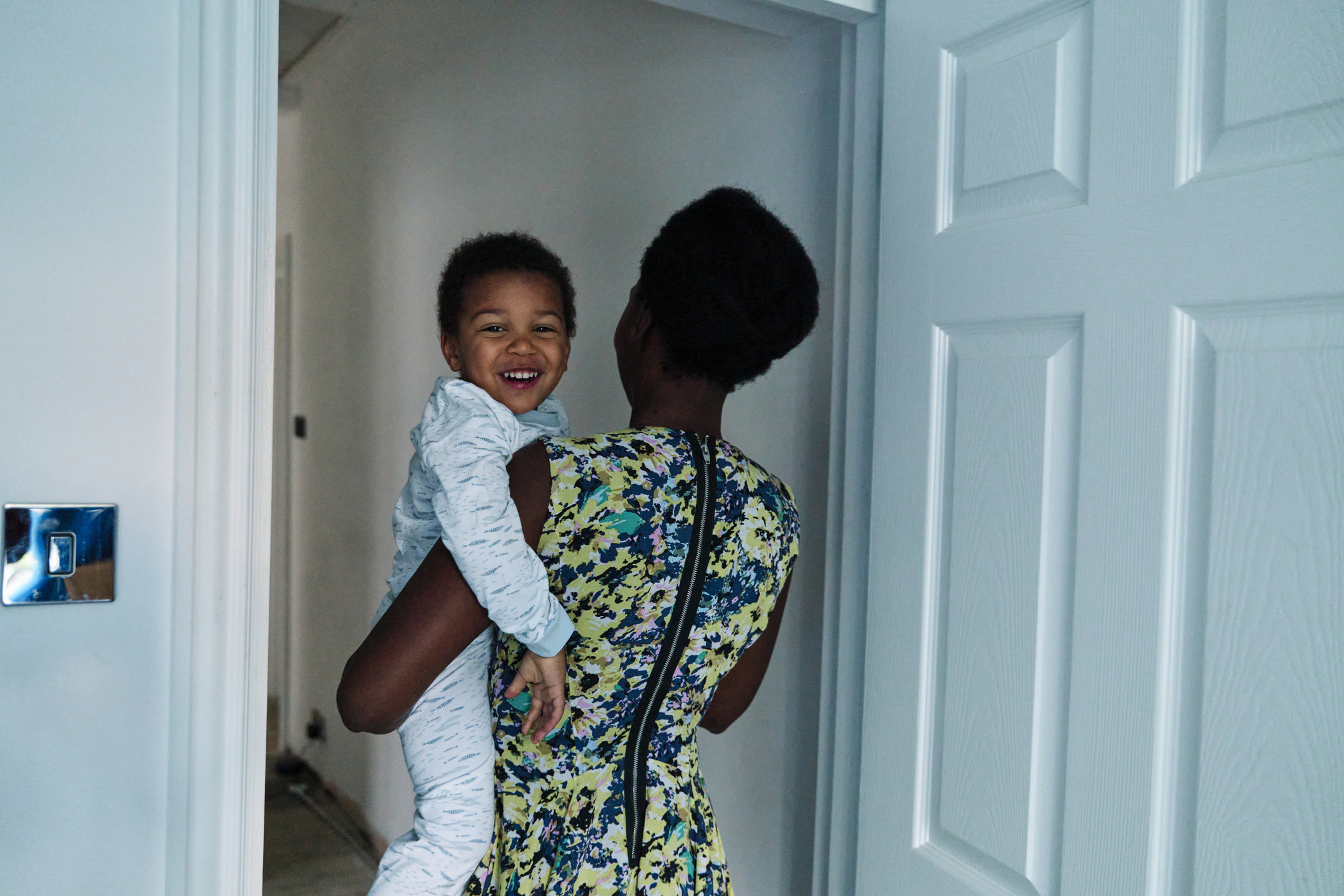 A woman holding a child