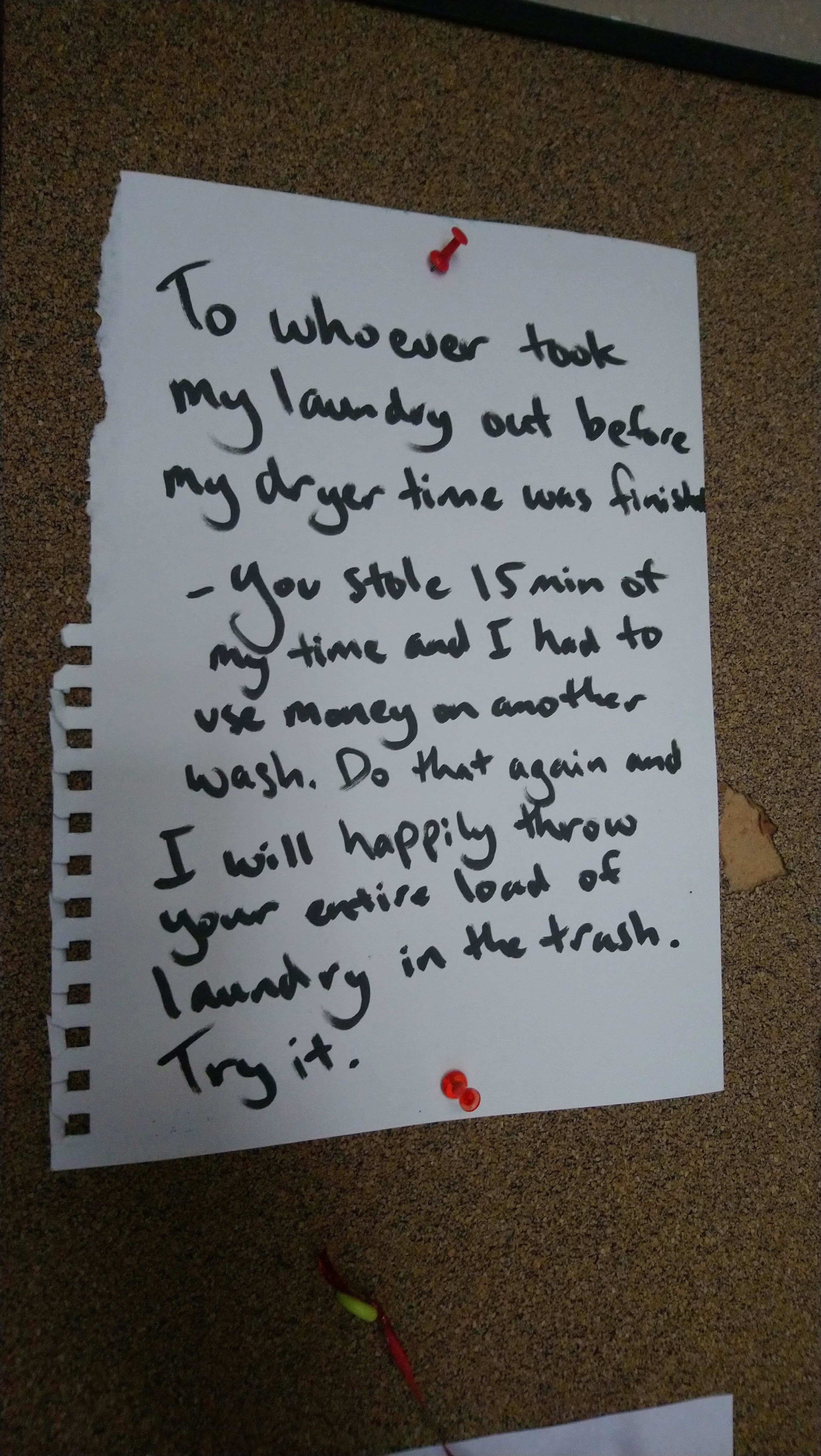Angry note threatening vengeance on someone who removed their clothes from a dryer 15 minutes before they were done