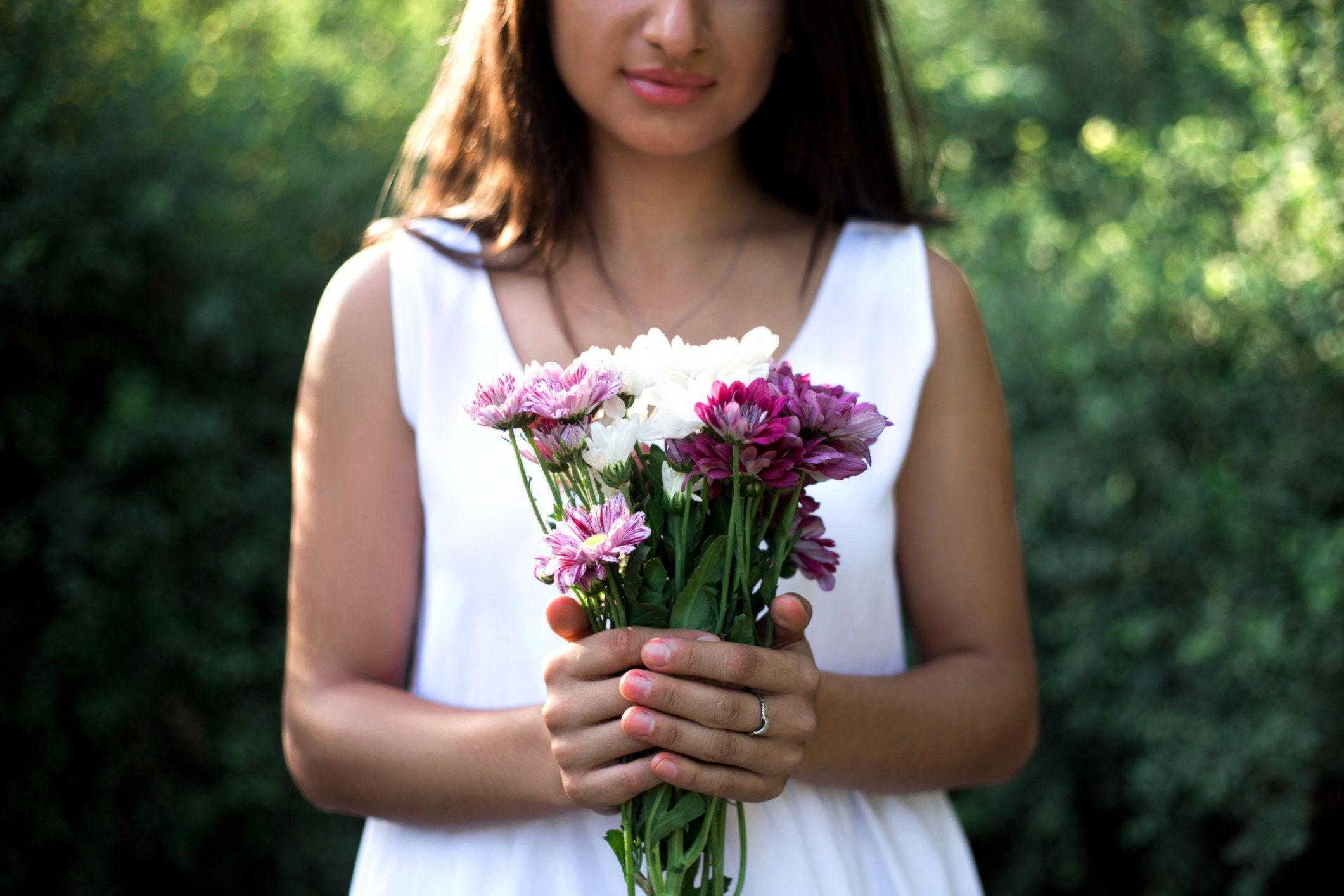 A woman holding a bouquet