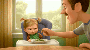 a cartoon dad having broccoli  thrown in his face by his toddler