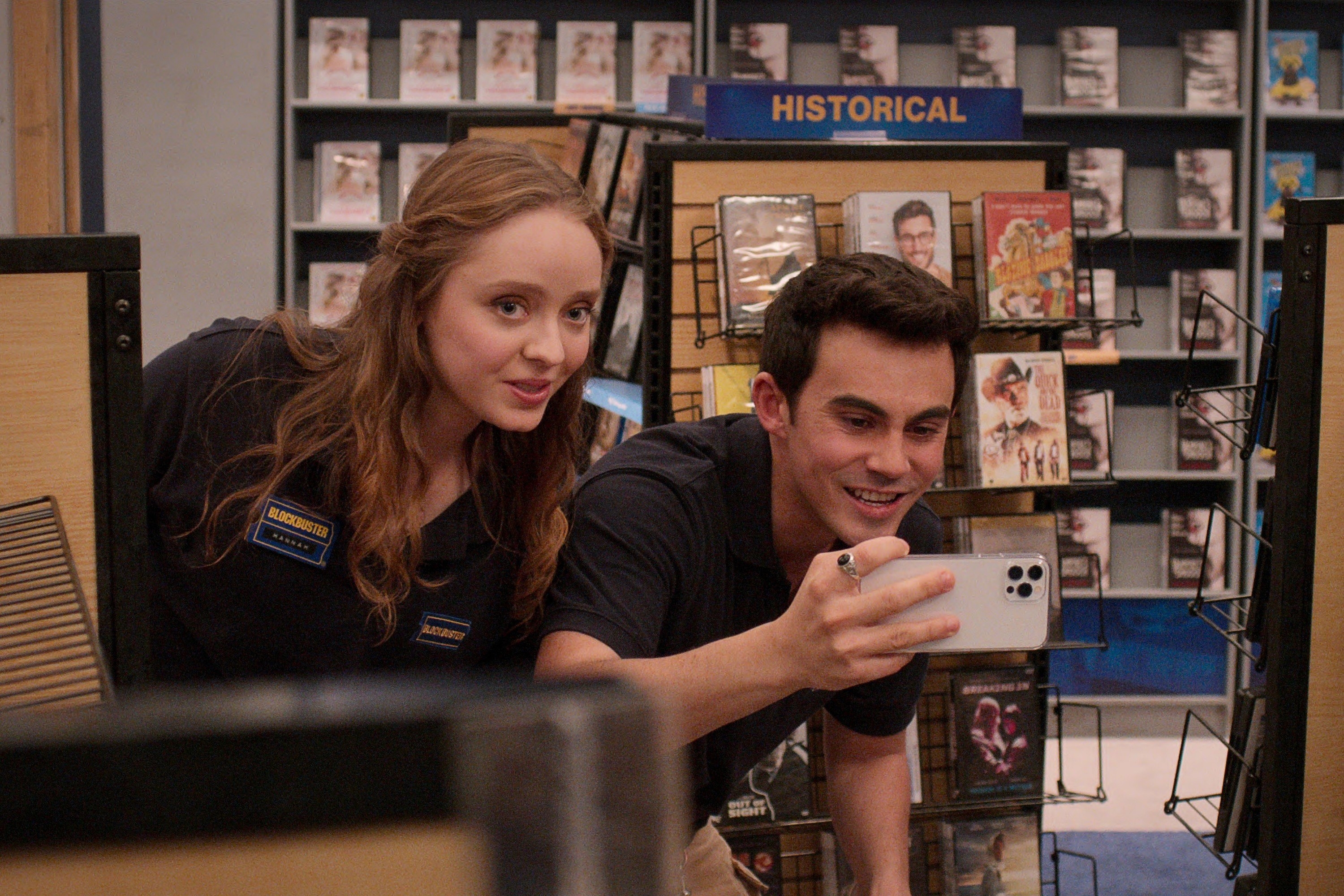 A man taking a photo in a store