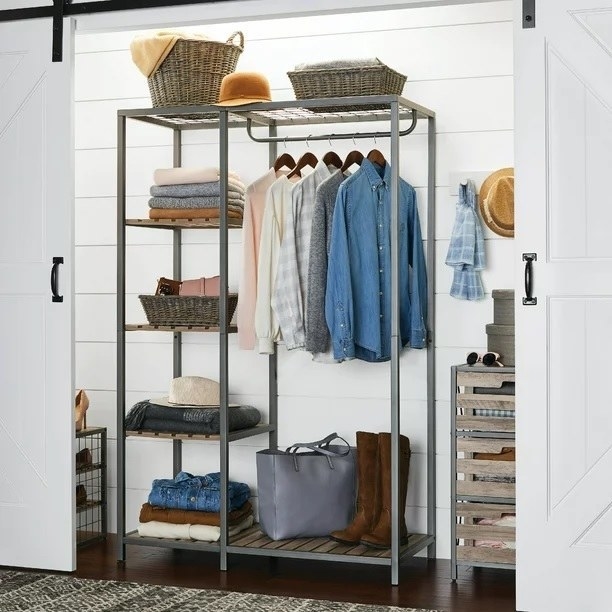 The garment rack stocked with clothes and accessories