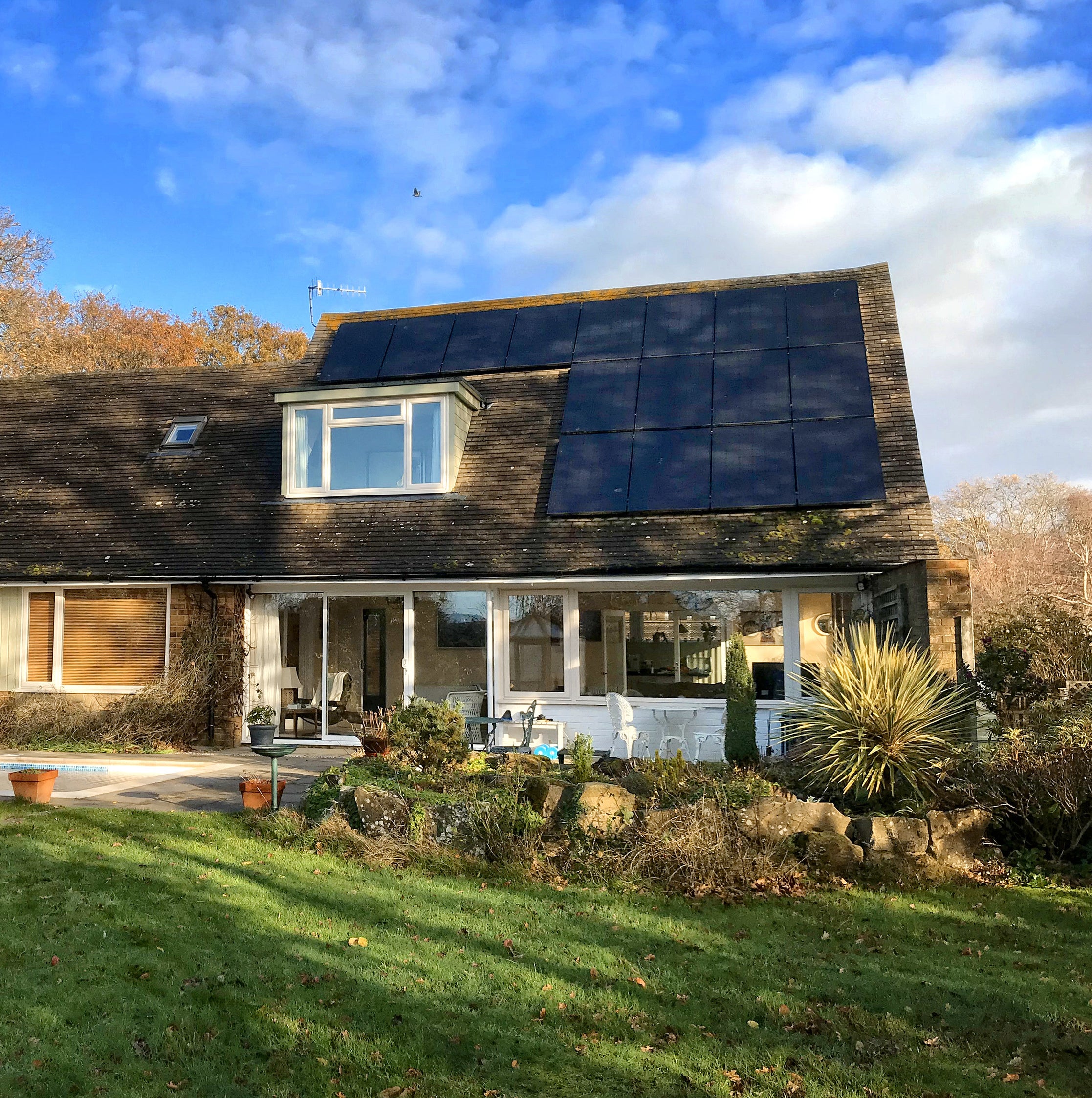 solar panels installed on the roof of a house