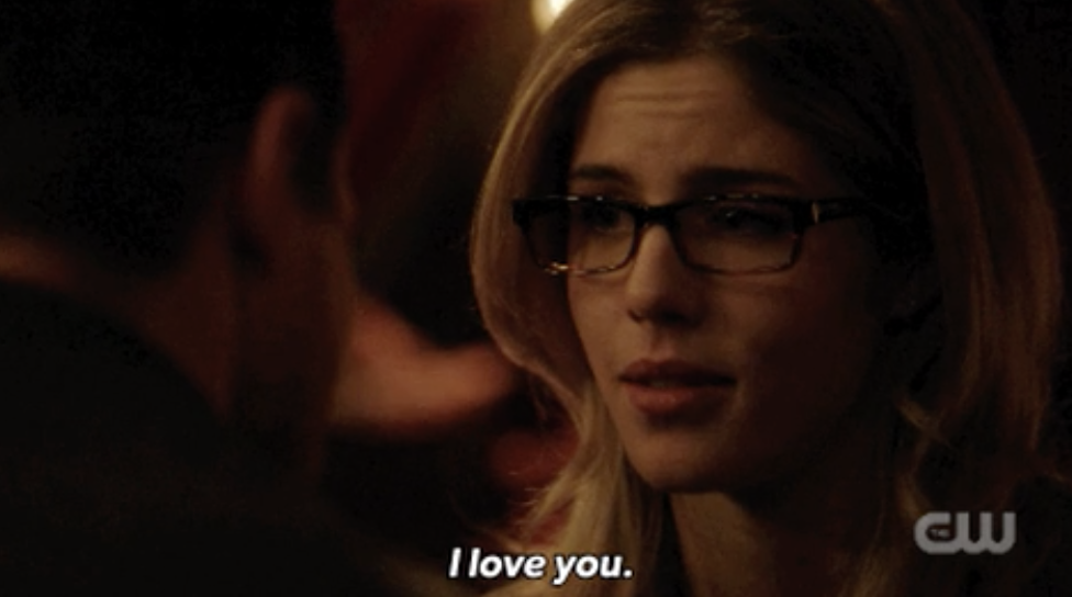 Close-up of Felicity looking at Oliver