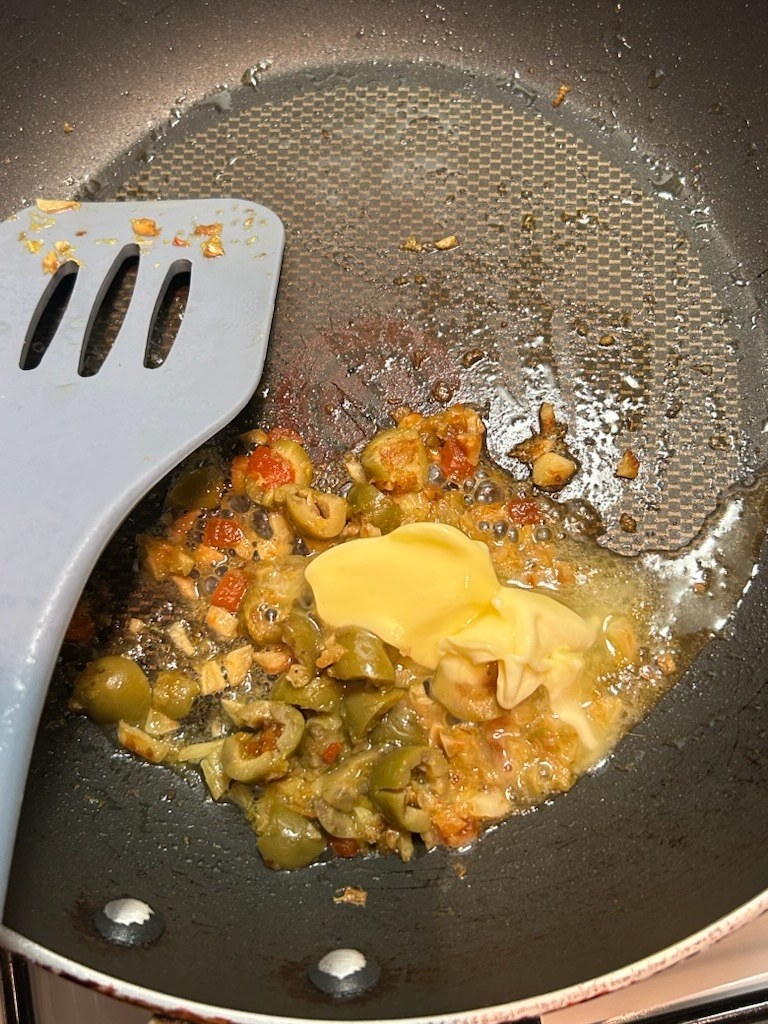 Butter and veggies in a skillet