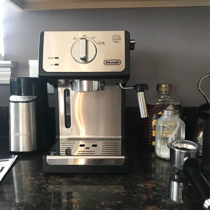 A reviewer photo of the espresso maker on a kitchen counter