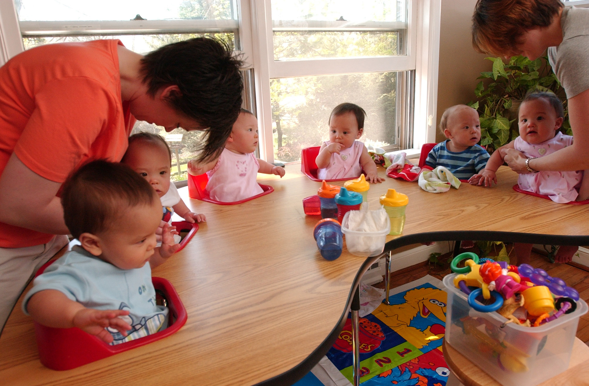 Nurse Angie Crawl and Kate Gosselin get Kate's kids (from left) Collin, Joel, Alexis, Leah, Aaden, and Hannah, ready for lunch