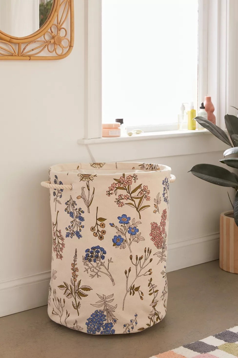 the floral laundry hamper on a floor
