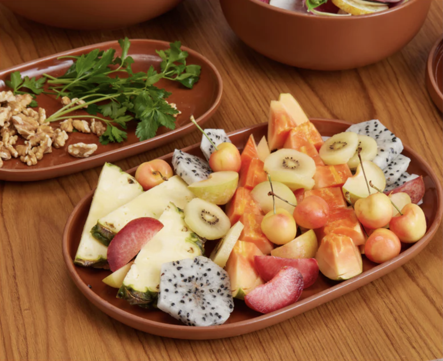 Fruit and garnishes on the two platters