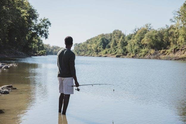 A man fishes in a St. Louis, Missouri, lake