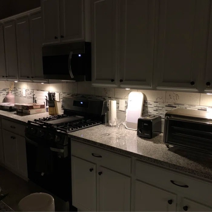 a reviewer photo of the lights under kitchen cabinets