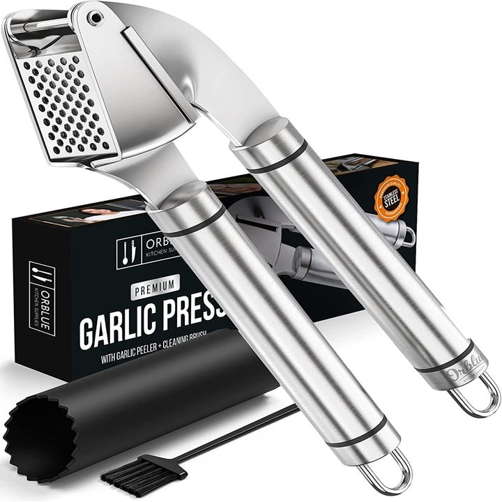 stainless steel garlic press with its packaging
